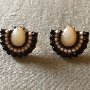Stud earrings. Black and cream